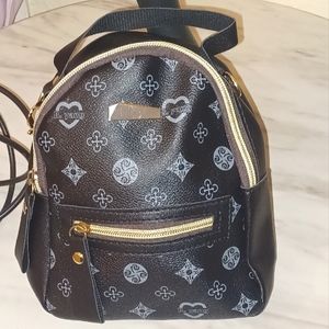 (Black) Faux-leather mini- backpack purse
